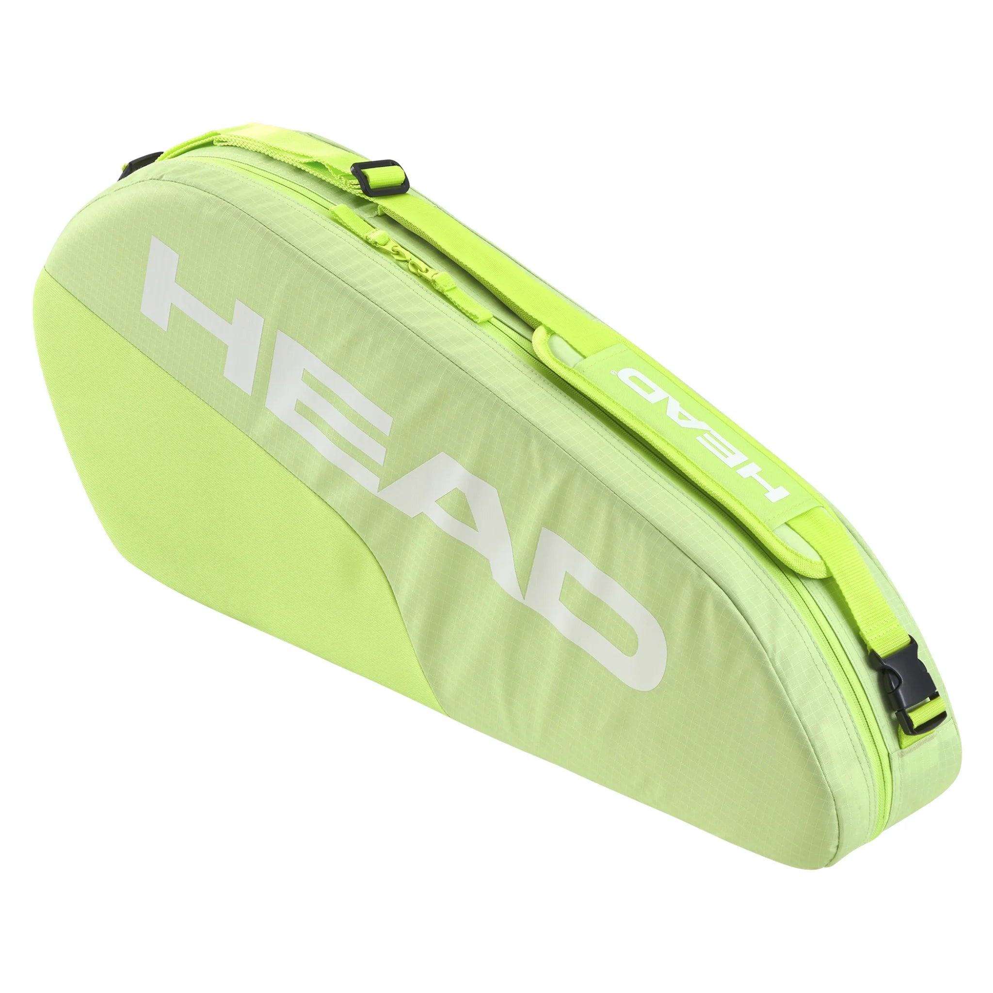 Side-on angled view of HEAD Base Racket Bag Small 16L, 76x32x9 cm, highlighting sage green fabric and slim profile shape.